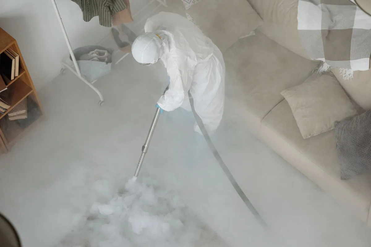 Biohazard cleanup technician in protective equipment, Ledgewood, NJ